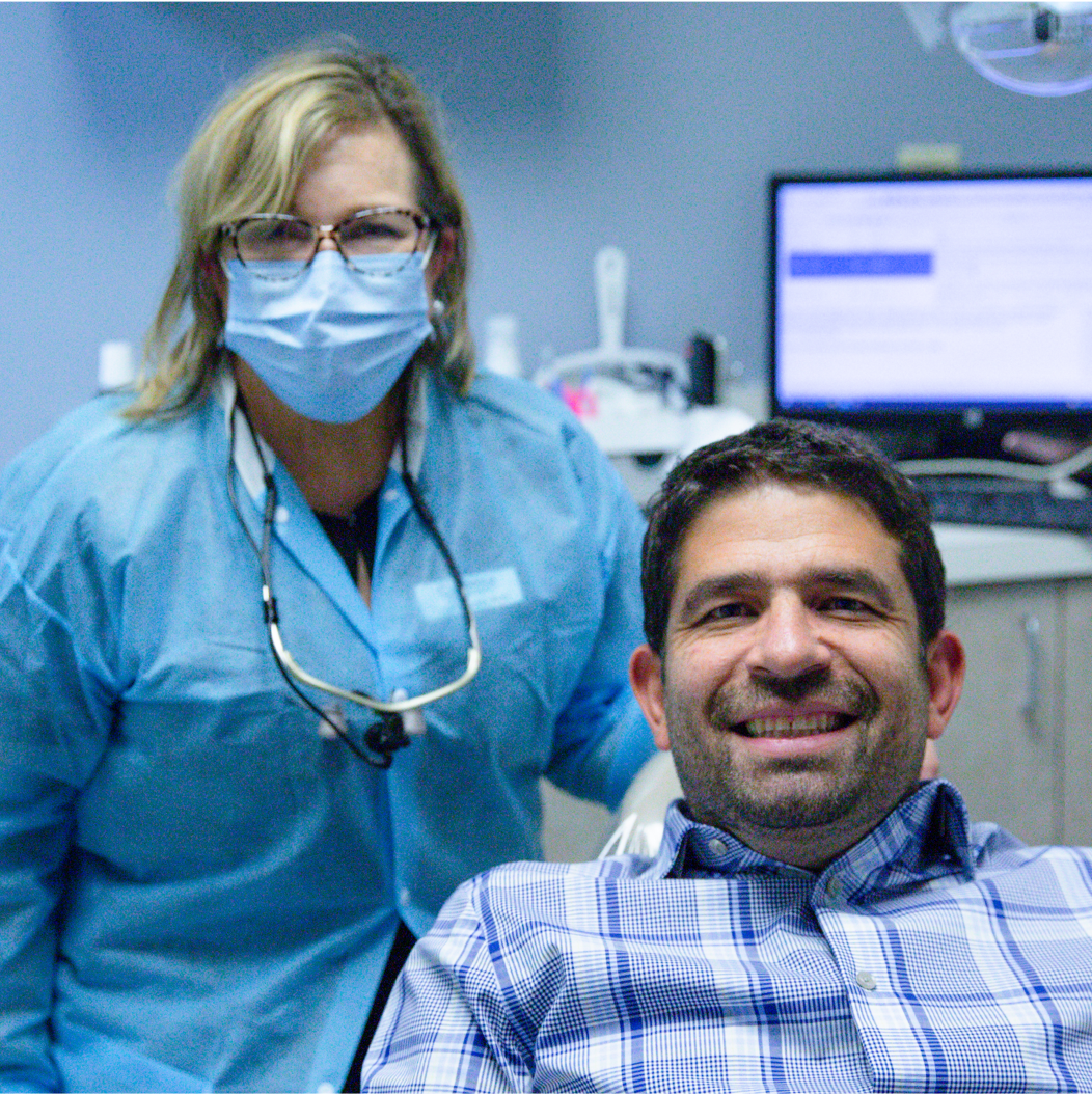 patient smiling with doctor